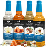 SYRUVIA frente del pack variado mostrando las cuatro botellas, mejora tus bebidas