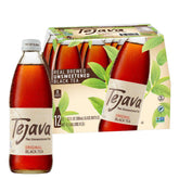 Tejava botella frontal de cristal mostrando etiqueta y diseño premium