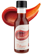 고맙당 botella Thank-you Kick Sauce al frente, fácil de rociar y usar