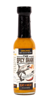 The Spicy Shark frente del envase mostrando etiqueta y diseño vibrante