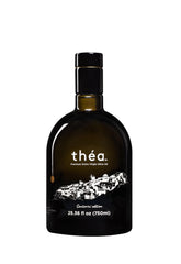 théa aceite premium frontal mostrando la botella oscura y caja de regalo