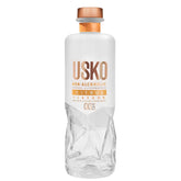 USKO Citrus frontal mostrando botella y color, ofrece base cítrica refrescante