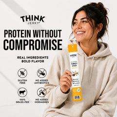 Think Jerky sobre tabla de charcutería con quesos y frutas, opción gourmet saludable