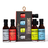 Thoughtfully pack frontal mostrando cuatro botellas, ideal para regalo