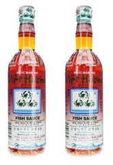 Three Crabs botella frontal mostrando etiqueta clara y uso culinario