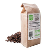 Tiny Footprint Coffee empaque frontal mostrando sello orgánico y beneficio climático
