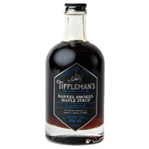 Tippleman's botella frontal mostrando el jarabe ahumado y su etiquetado elegante