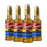 Torani avellana frente paquete mostrando 4 botellas, conveniencia de reserva