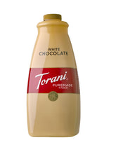 Torani botella frontal 64 oz mostrando la marca y volumen, útil para bares