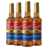 Torani botella frontal mostrando el jarabe y su beneficio de sabor consistente