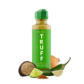 TRUFF botella frontal mostrando etiqueta y 6 oz, presentación premium