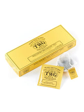 TWG empaque frontal elegante mostrando la caja y el logotipo beneficioso para regalo