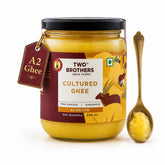 Two Brothers India Farms ghee frontal en envase, calidad artesanal