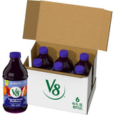 V8 frente de botella Pomegranate Blueberry mostrando etiqueta y beneficio nutritivo