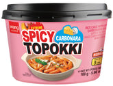 Wang tazón frontal con tteokbokki cremoso y picante, ideal para comidas rápidas