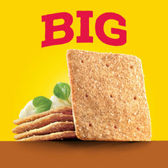Wheat Thins en tabla de quesos realzando aperitivos de fiesta