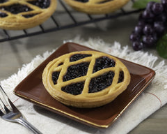 Wine Country Gift Baskets hojaldre y aceitunas presentados para compartir