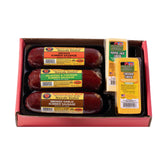 Wisconsin Cheese Company caja gourmet frontal mostrando quesos y embutidos, ideal para regalo