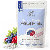 Xylify Happy Teeth envase frontal mostrando cantidad y sabor, portátil y práctico