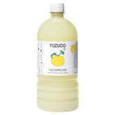YUZUCO botella frontal mostrando marca y formato grande para uso profesional
