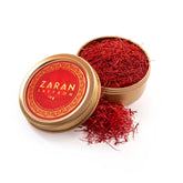 Zaran Saffron lata frontal mostrando envase premium y protección del azafrán