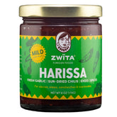 Zwita frasco frontal mostrando etiqueta artesanal y beneficios de sabor