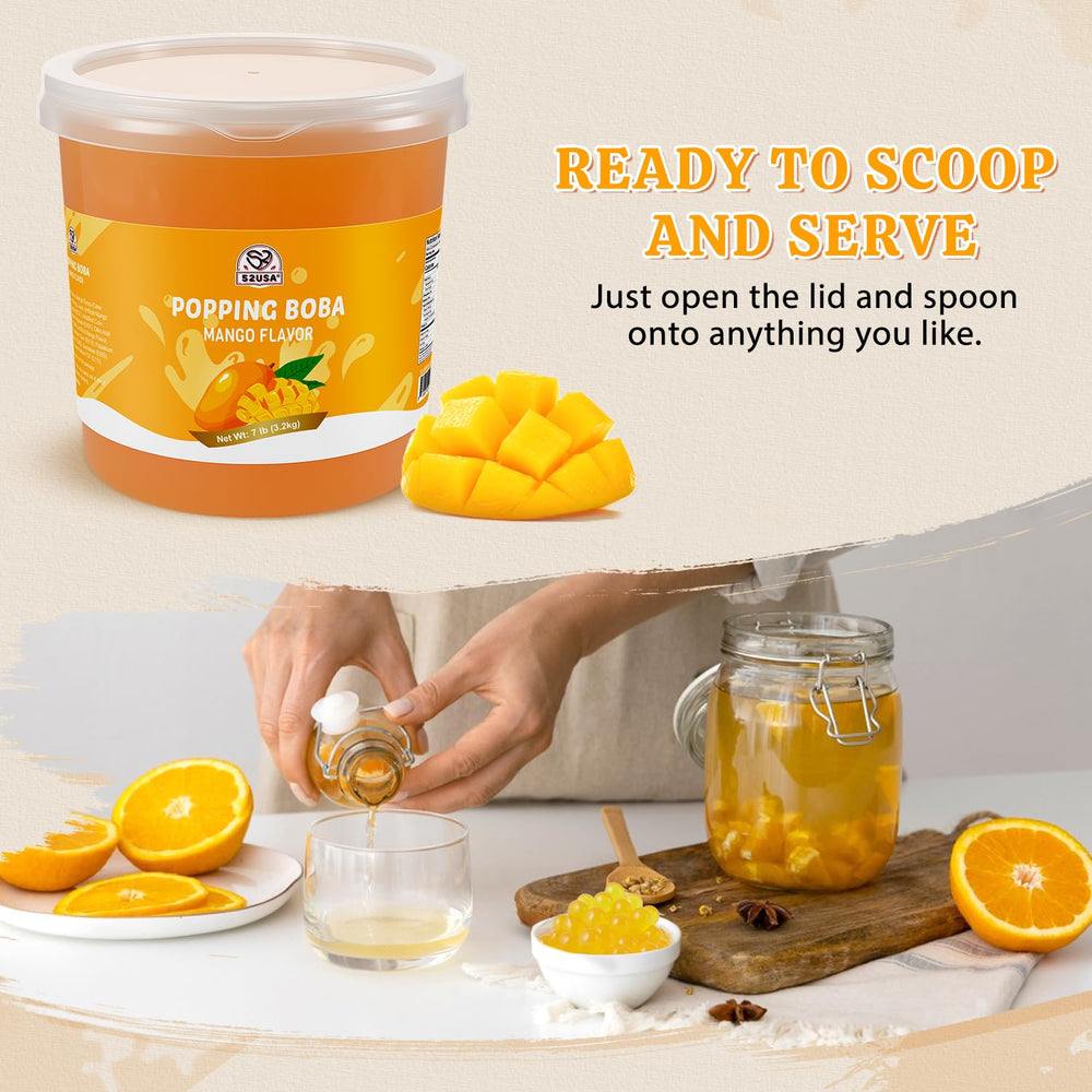 52USA.com topping de perlas de mango sobre una bola de helado para contraste cremoso