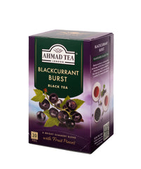 Ahmad Tea textura de hojas negras y trozos de mora visible y natural