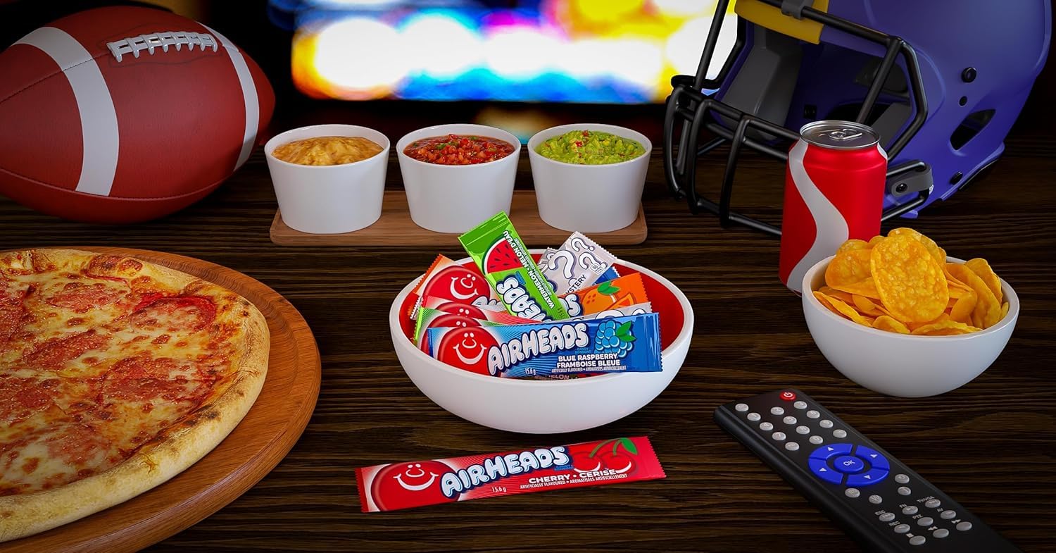 Airheads mini en mano para comparar tamaño y porción individual