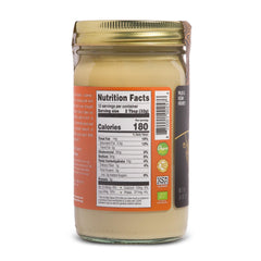 Artisana mantequilla de anacardo untada en tostada, beneficio sabor versátil en desayuno