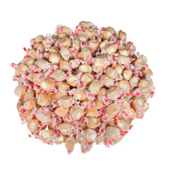 Assortit frasco con taffy en mostrador ideal para exhibir y servir en eventos