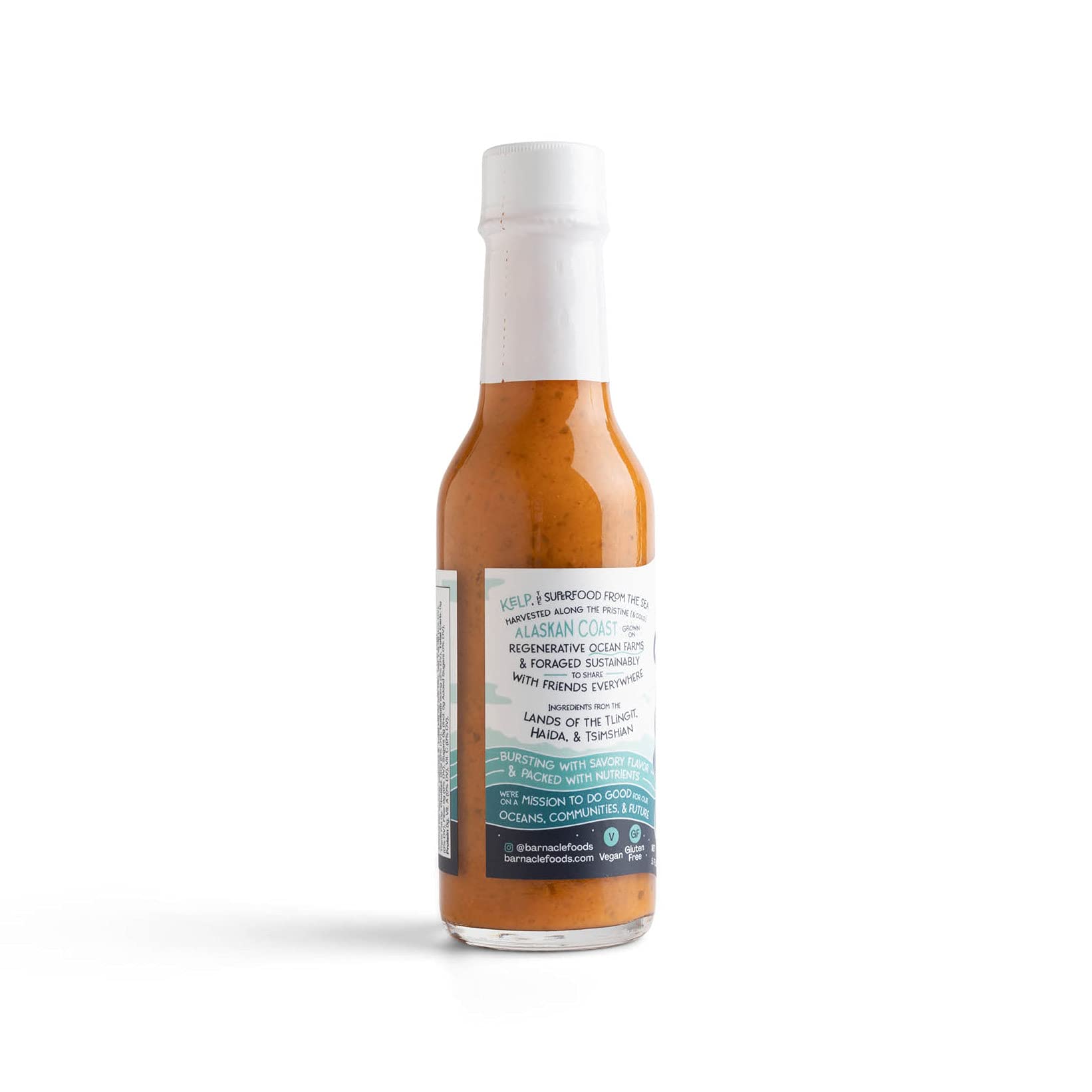Barnacle Foods botella junto a utensilios para comparar tamaño práctico