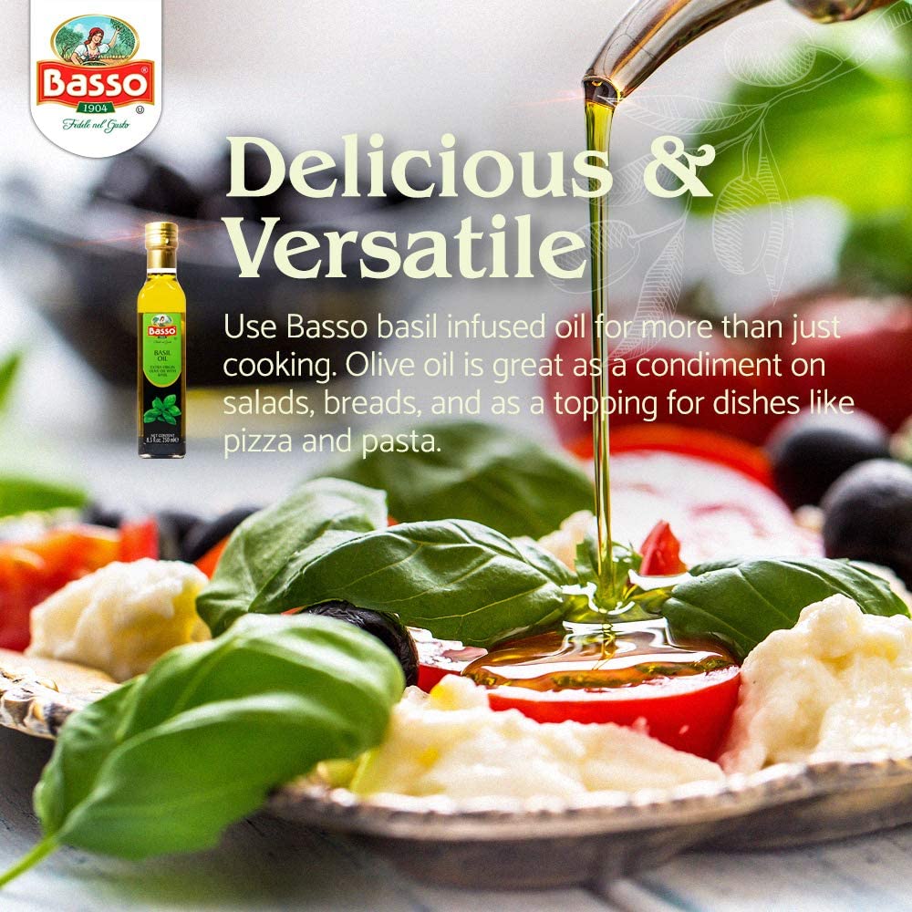 Basso botella junto a hojas de albahaca fresca aporta aroma