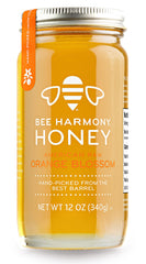 Bee Harmony frasco frontal de miel de azahar mostrando color claro y beneficio visual