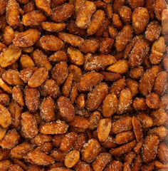 Belmont Peanuts cacahuete en mano para comparar tamaño extra grande Virginia