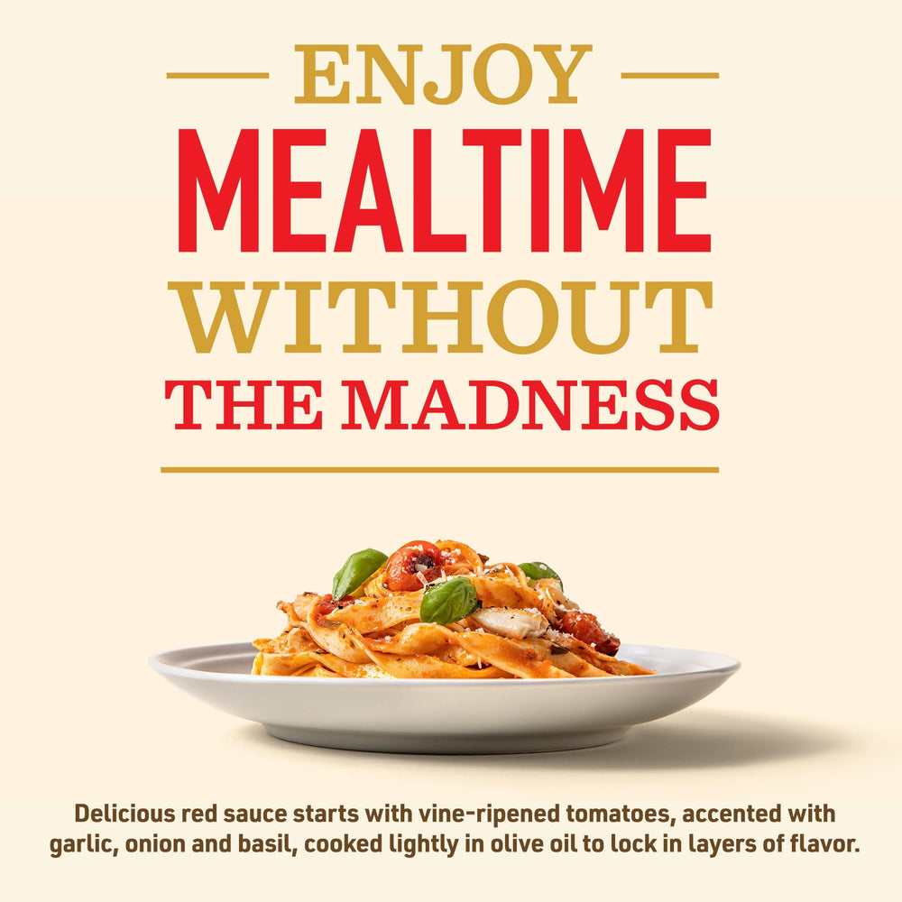 Bertolli textura cremosa de la salsa en cuchara lista para mezclar