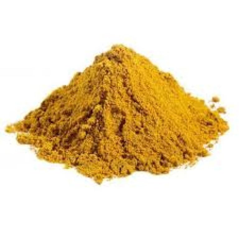 Betapac Curry Powder usado sobre arroz realzando sabor caribeño