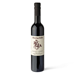Blazing Bella botella frontal mostrando apariencia elegante y sabor consistente
