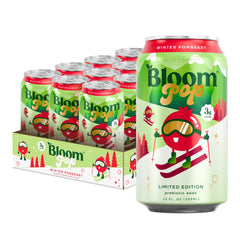 Bloom Nutrition lata frontal mostrando sabor Winter Pomberry y apoyo digestivo