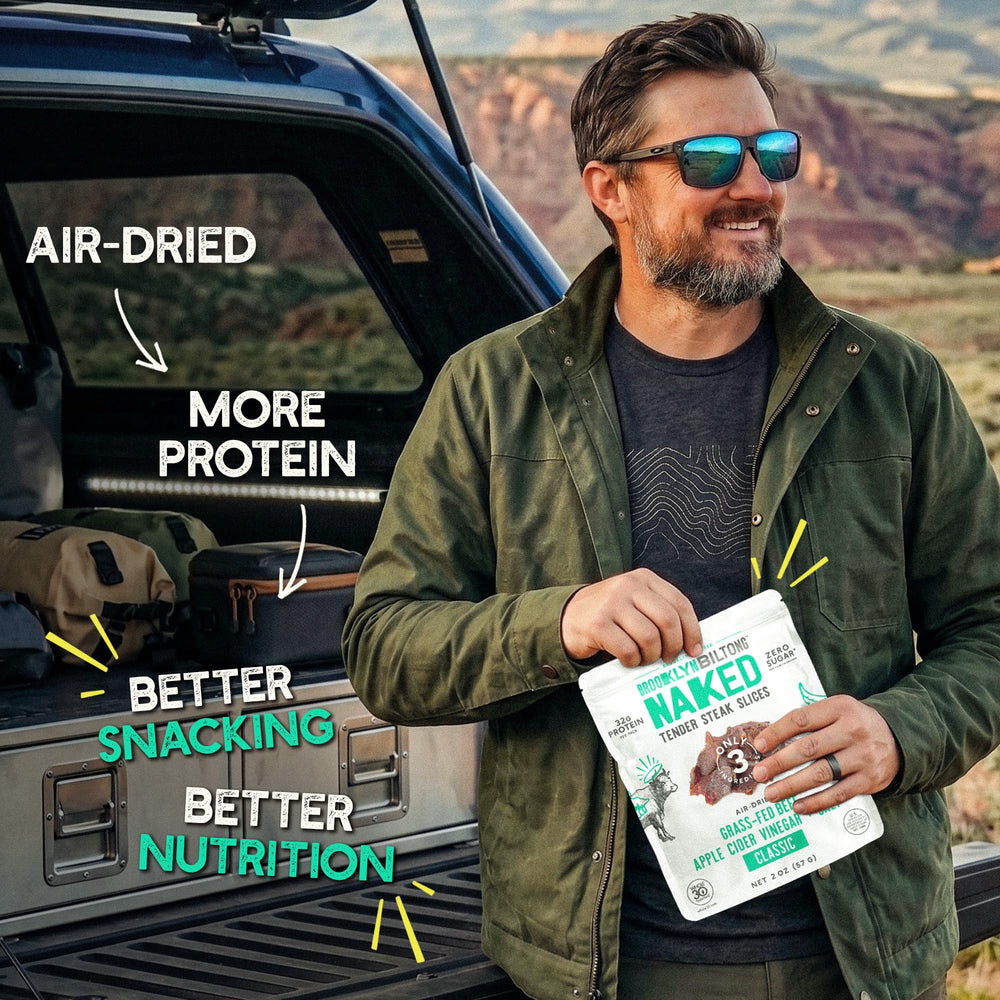 Brooklyn Biltong rebanadas sobre ensalada aportando proteína completa
