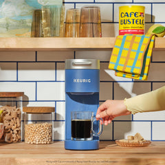 Café Bustelo caja abierta con diez cápsulas para almacenamiento ordenado
