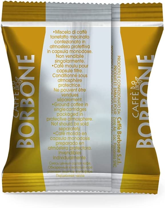 Caffè Borbone cápsula insertada en máquina Nespresso Original, uso fácil y rápido