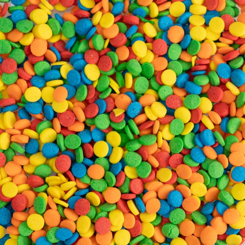 Close-up de textura de confeti Cake Mate mostrando colores vivos y consistencia uniforme
