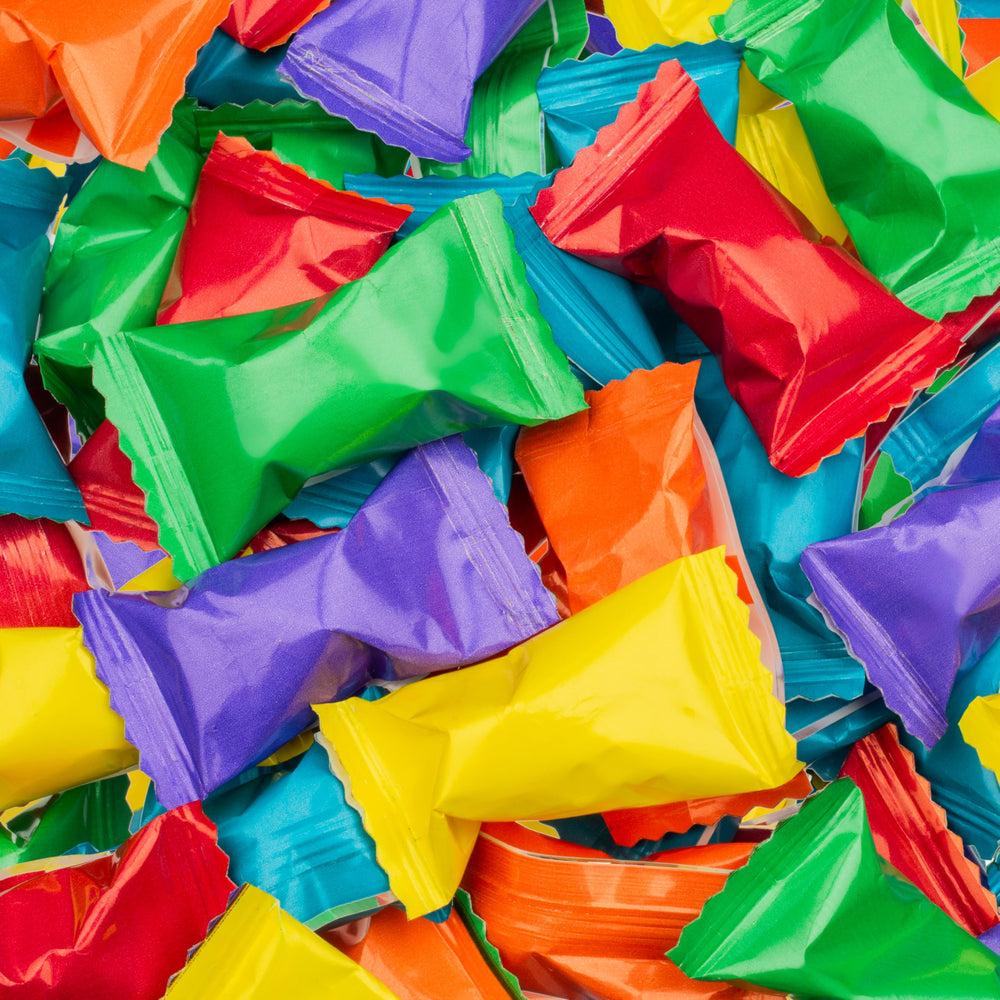 Candy Envy primer plano de la textura cremosa del caramelo que sugiere suavidad