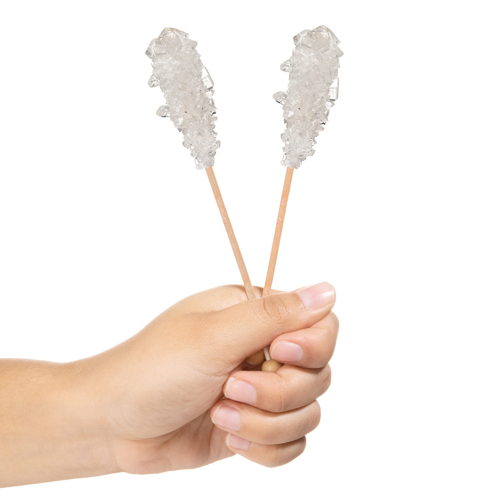 Candy Envy palito en mano para comparar tamaño, porción controlada