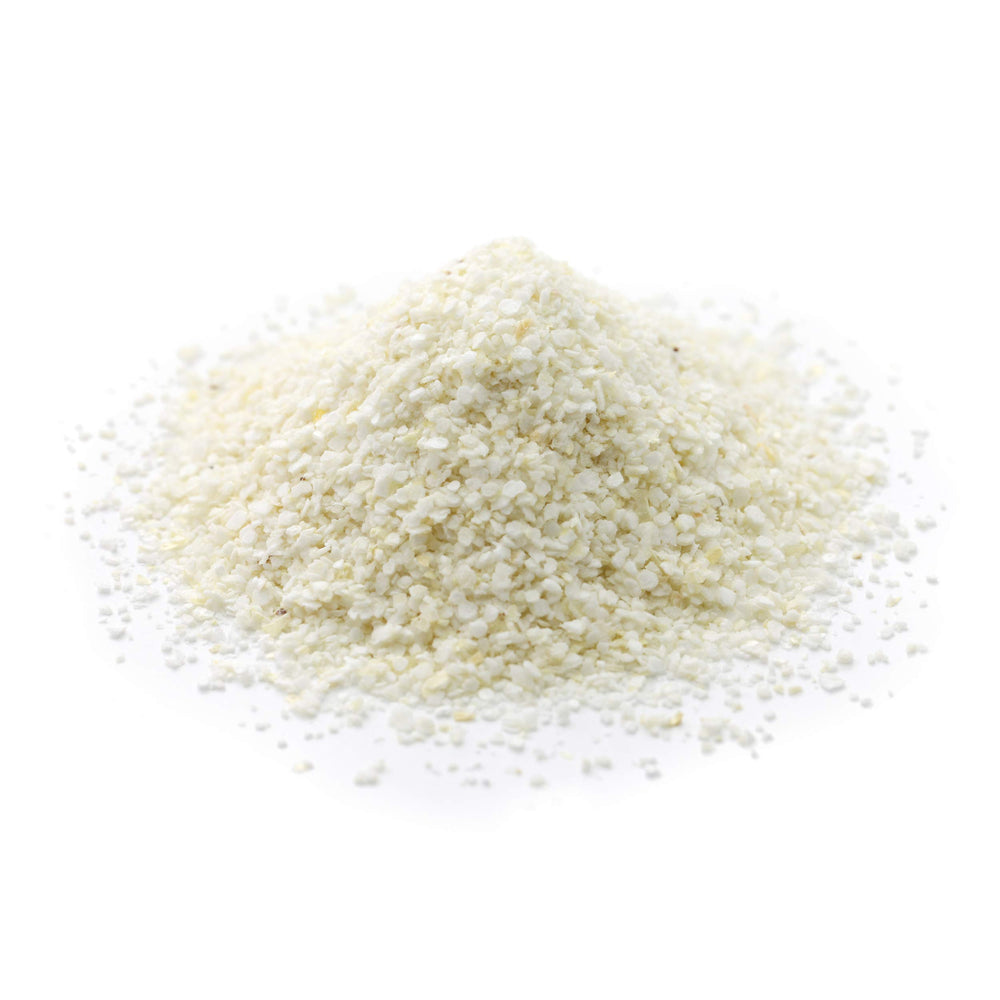 CAROLINA GRITS porción servida en plato como acompañamiento sabroso