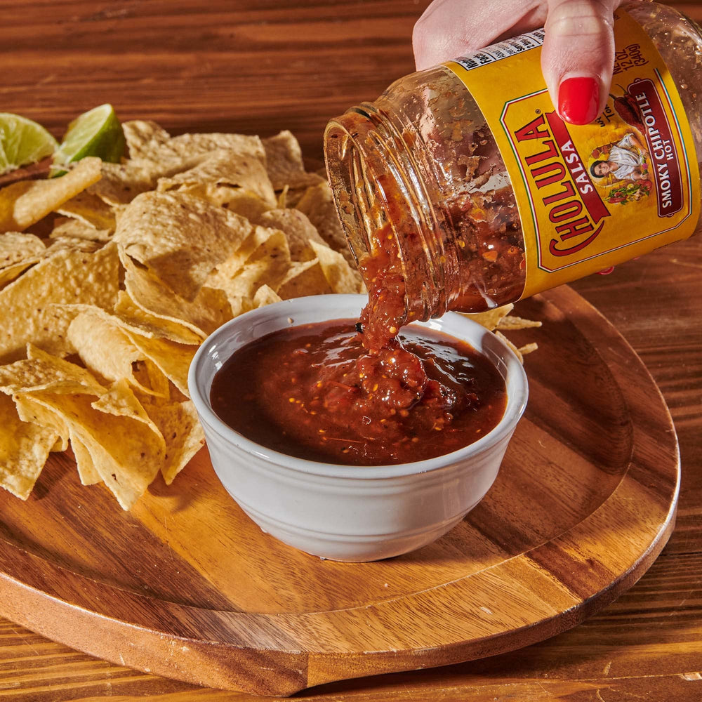 Cholula salsa en tacos que realza sabores en cocina casera