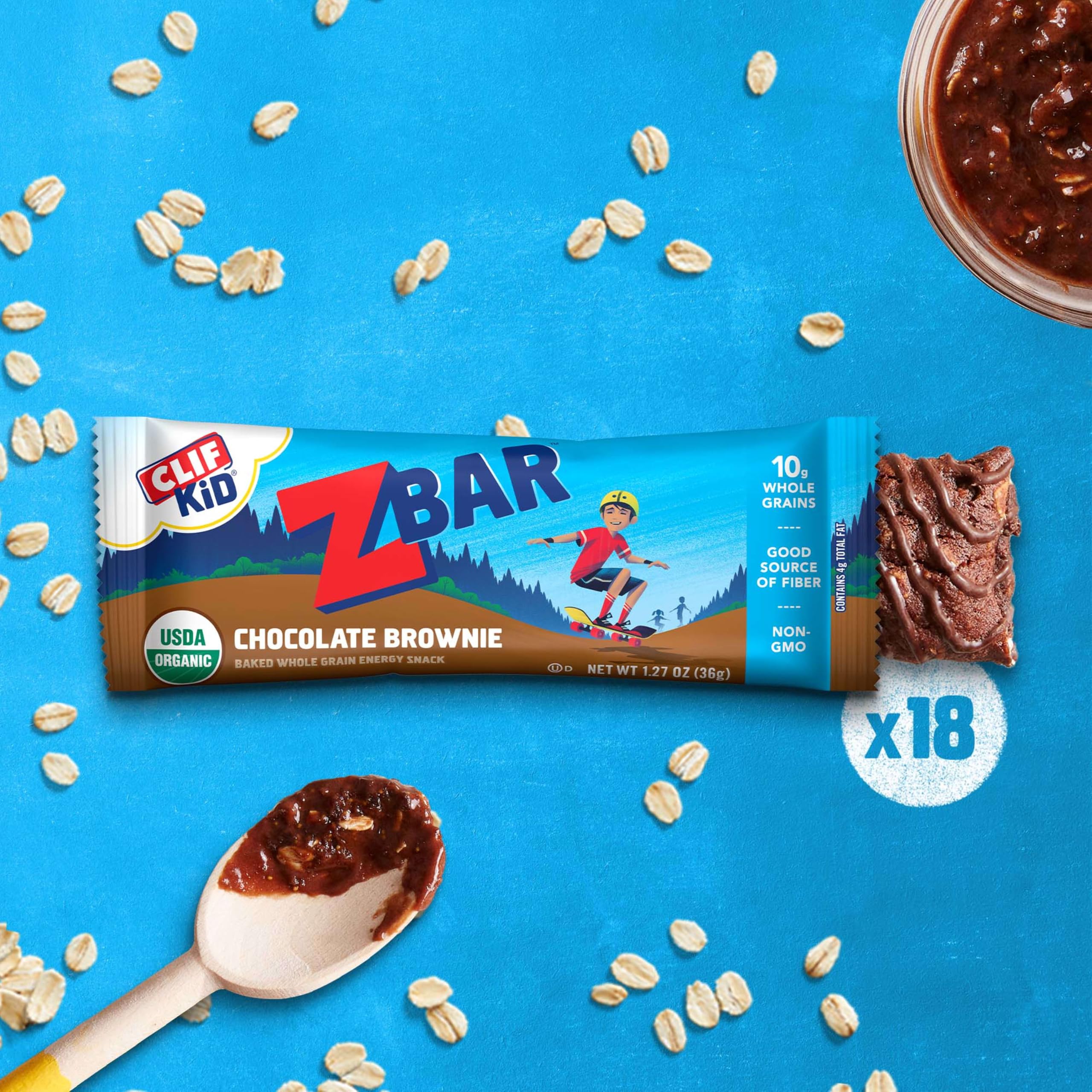 Clif Kid ZBar acercamiento a la textura masticable que resalta avena y trozos de chocolate