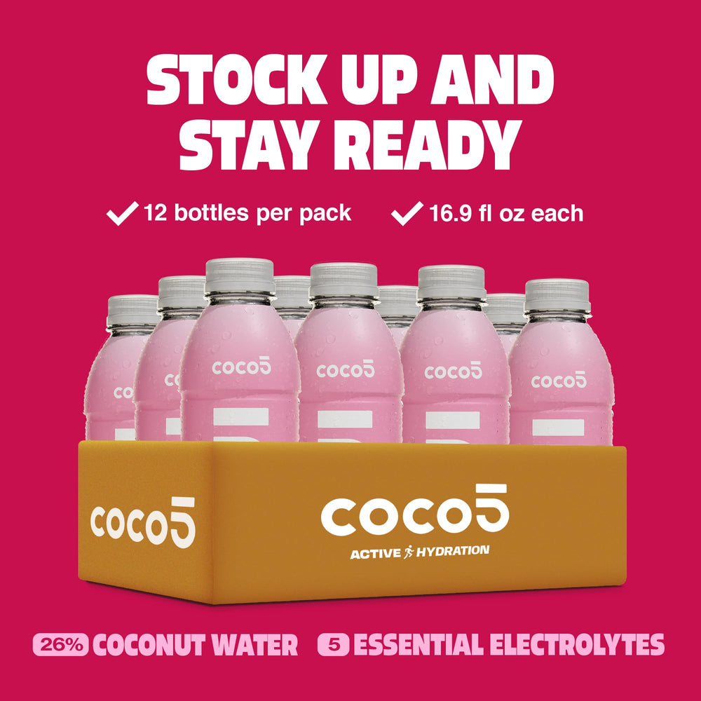 Varias botellas Coco5 sobre mesa en ambiente cotidiano, ideal para compartir