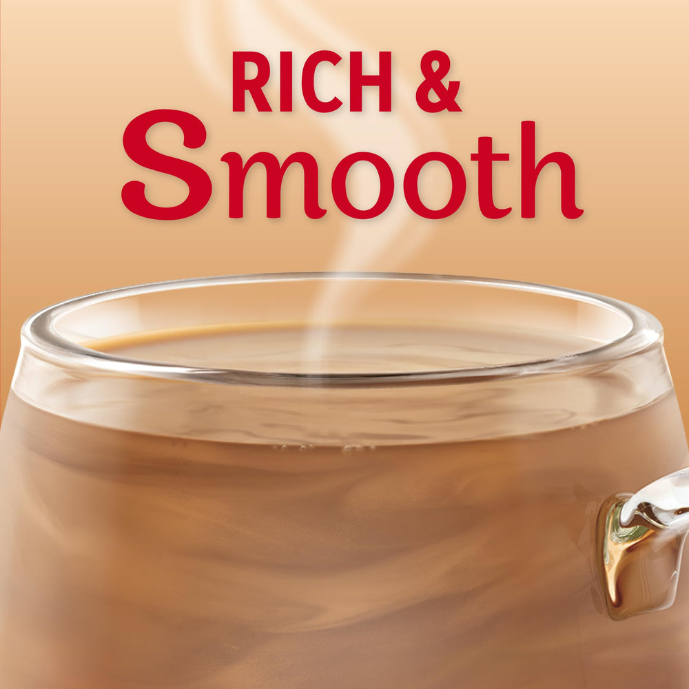 Coffee Mate cucharada vertida en café caliente para cremidad instantánea